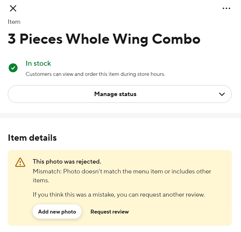 The DoorDash Menu Manager item drawer for a wing combo. A yellow notice reads 'This photo was rejected. Mismatch: Photo doesn't match the menu item or includes other items. If you think this was a mistake, you can request another review.' Below it are two controls, Add new photo and Request review. The item is still marked In stock.